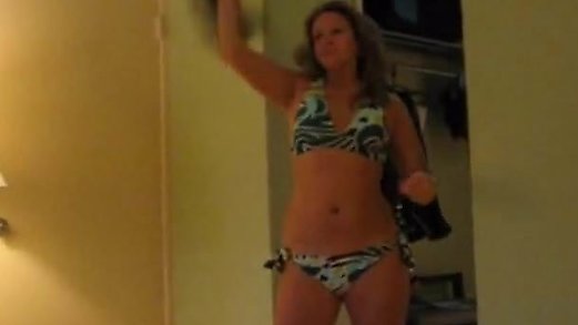 Neighbors wife stripping for me in a hotel room.