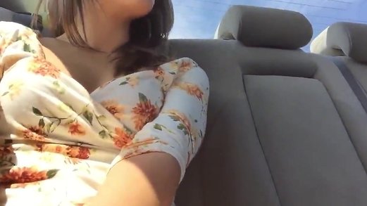 Lady flashes in the back of the Uber ride