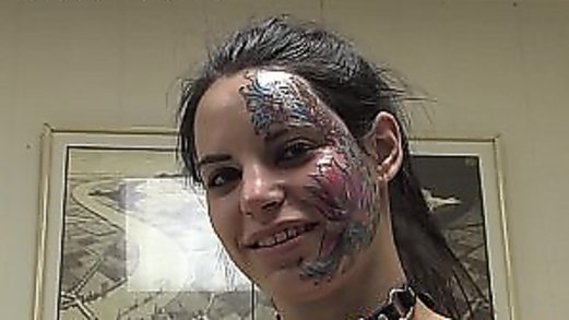 Extreme half face tattoo