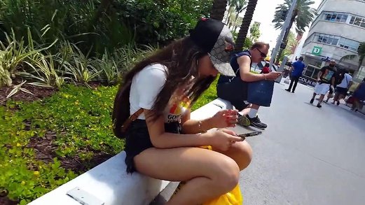Candid voyeur hot teen sitting playing on phone