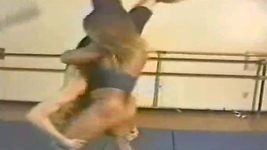 FBB Sharon Marvel wrestling a guy